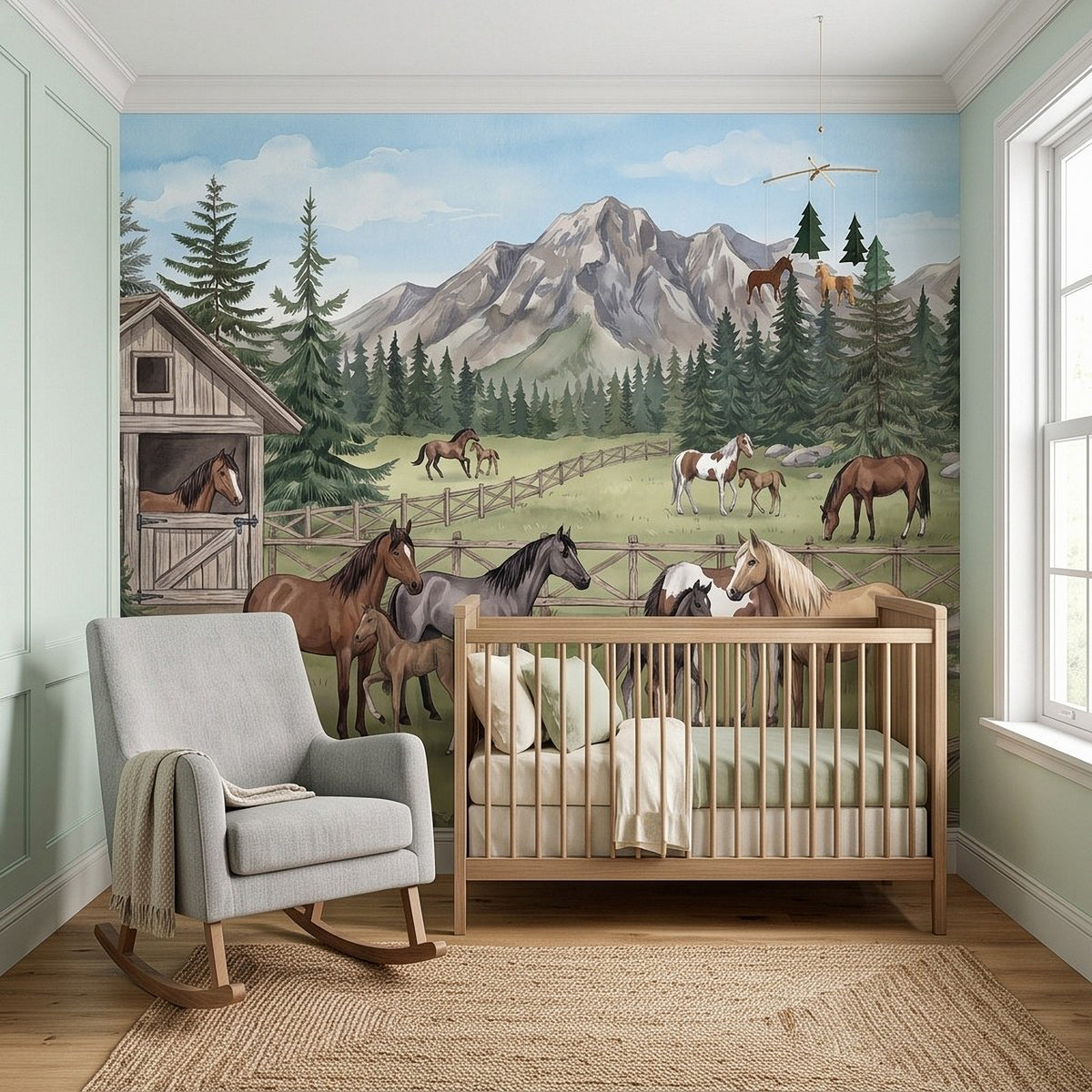 Equestrian wall mural with horses and foals, barn, fence, pine forest, and mountains