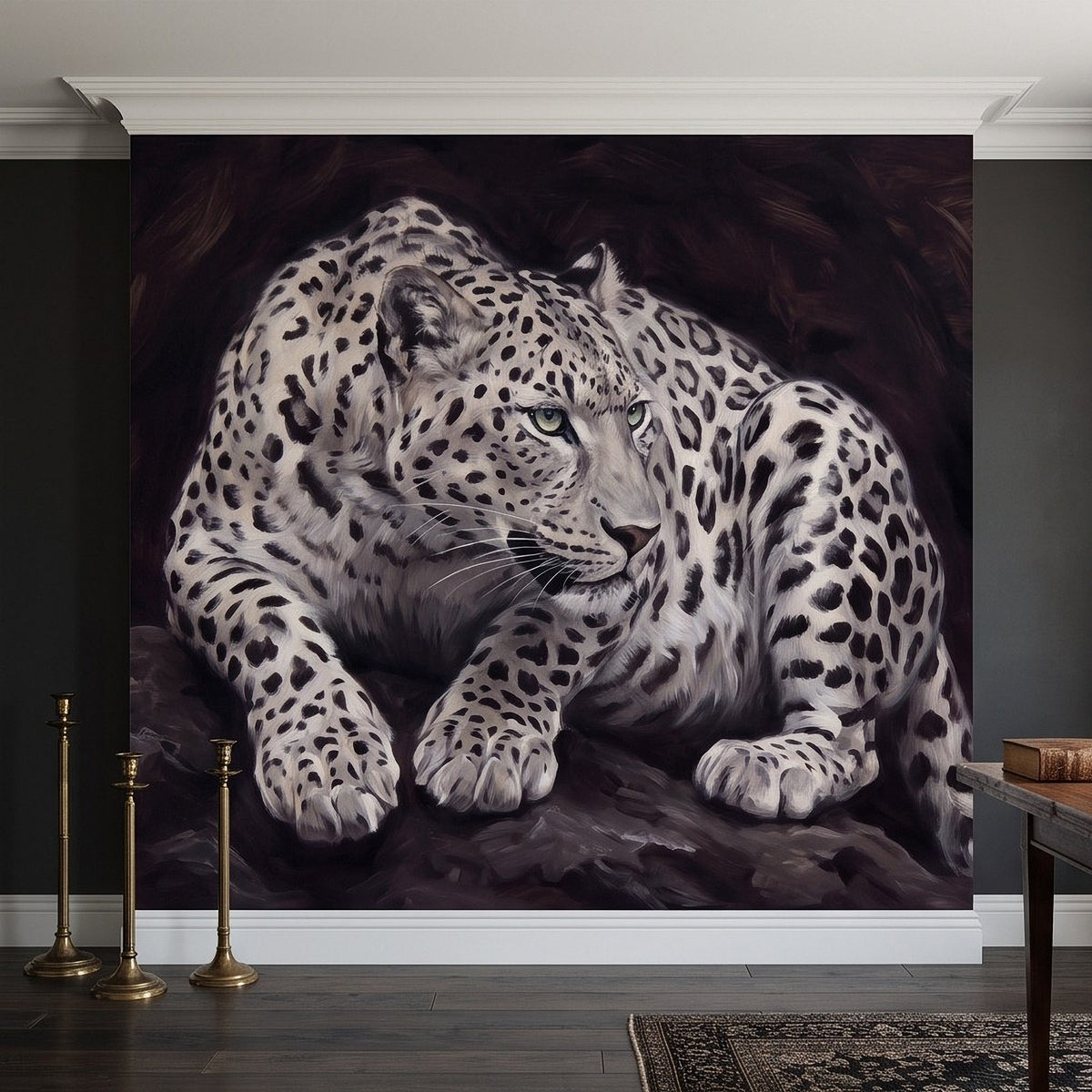 Snow leopard wall mural with a large portrait of a crouching cat and sharp facial details