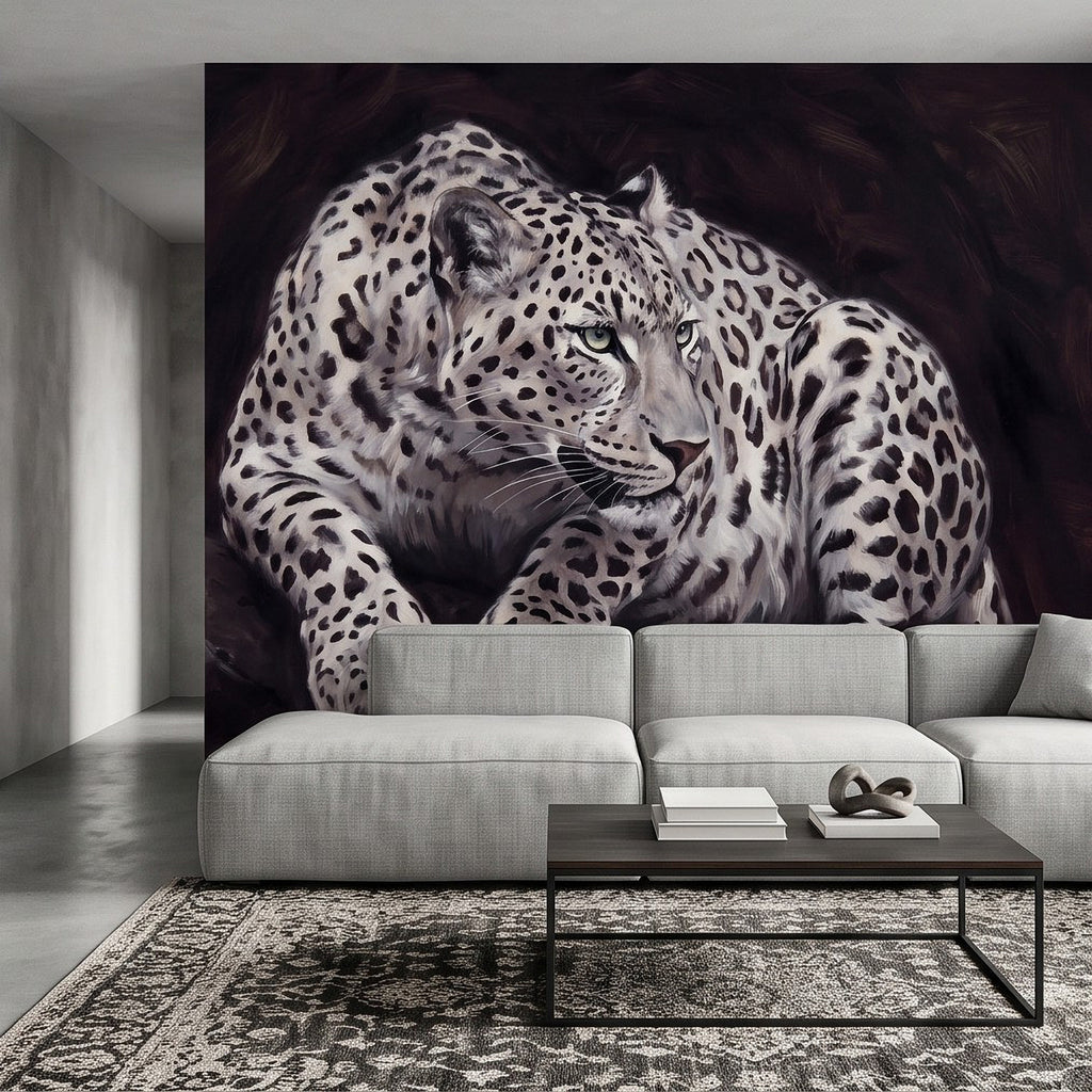 Snow leopard wall mural with reclining big cat, spotted markings and intense gaze