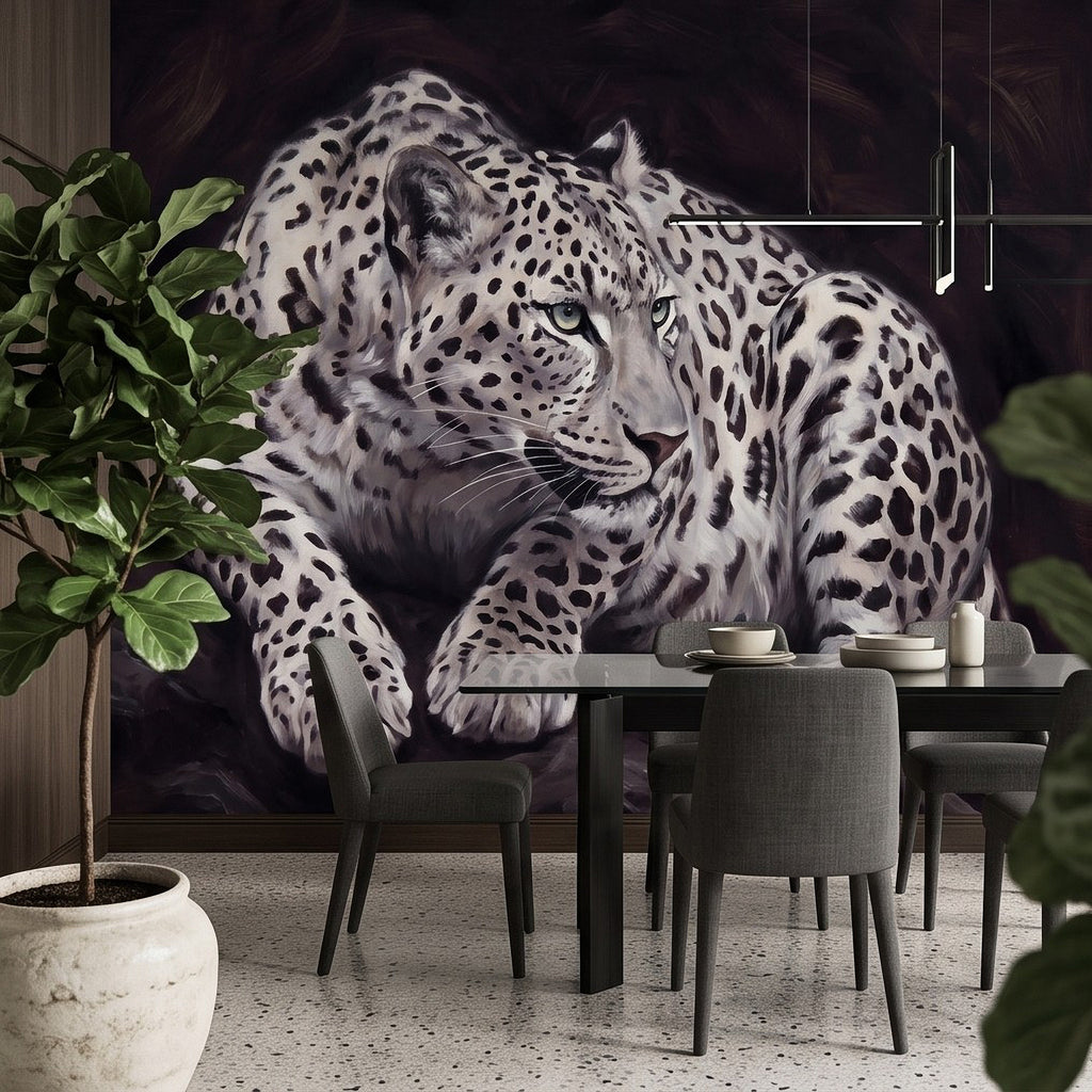 Snow leopard portrait wall mural, crouching pose with spotted coat and piercing gaze