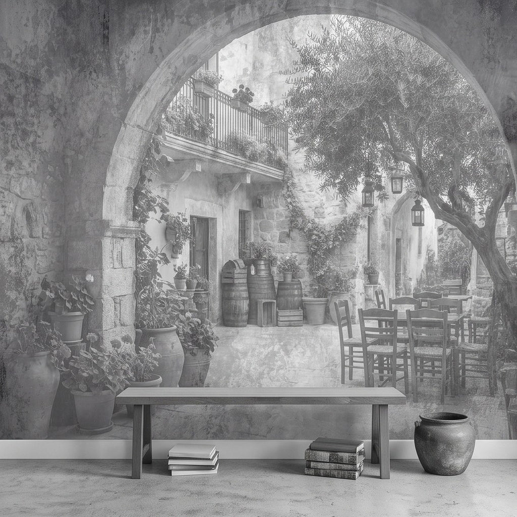 Courtyard wall mural with stone arch, large tree branches, and stacked pots and chairs