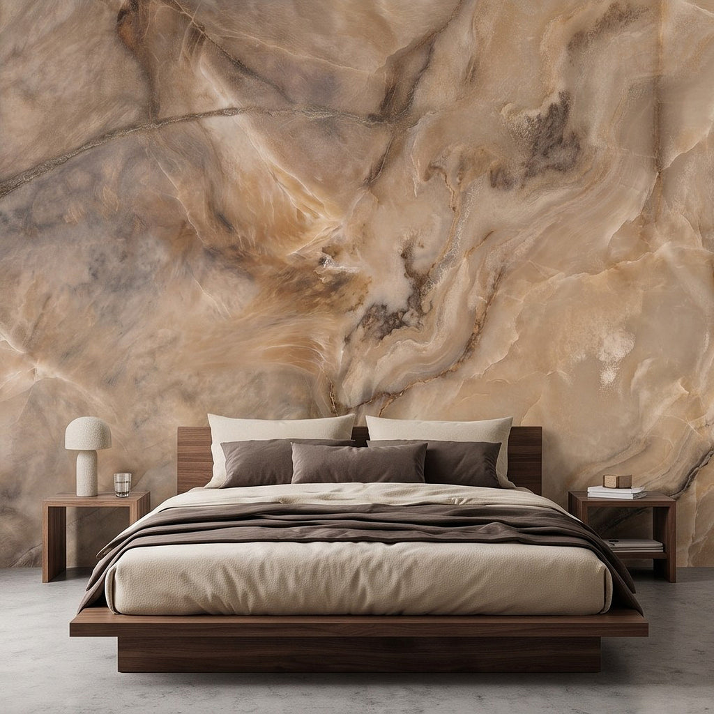 Beige faux stone wall mural featuring flowing cream and brown marble veining behind a bed