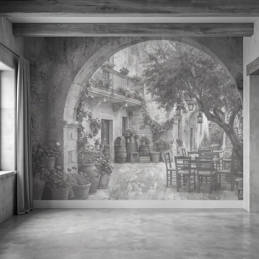 Monochrome courtyard scene wall mural with large stone arch, plants, and garden path