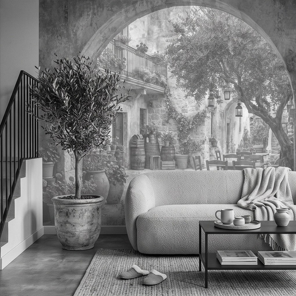 Vintage courtyard wall mural with stone arch, olive tree in planter, and doorway
